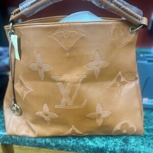 Elegant Tan Monogram Shoulder Bag